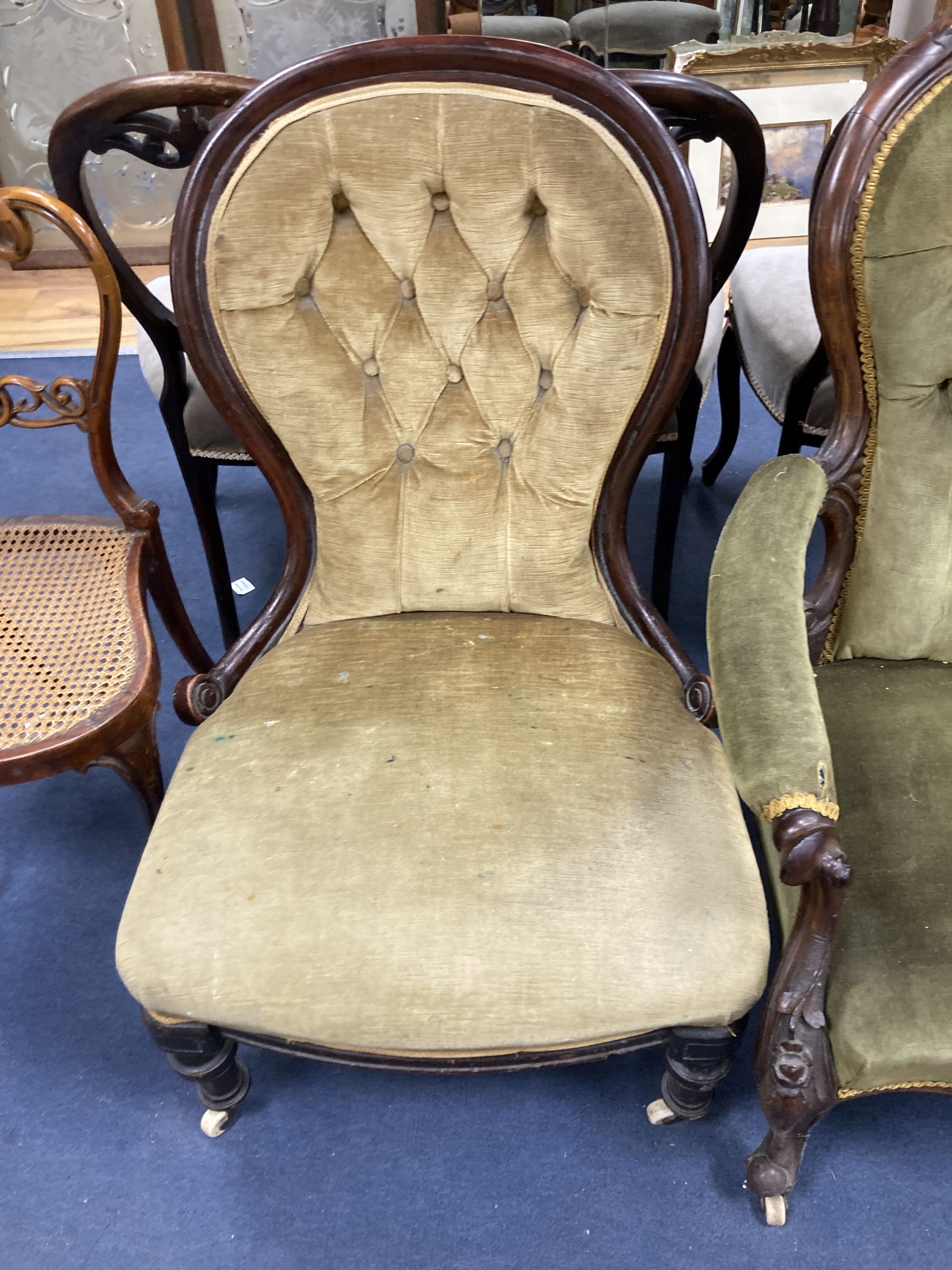 A Victorian mahogany open armchair, a Victorian nursing chair, five balloon back dining chairs and a caned chair